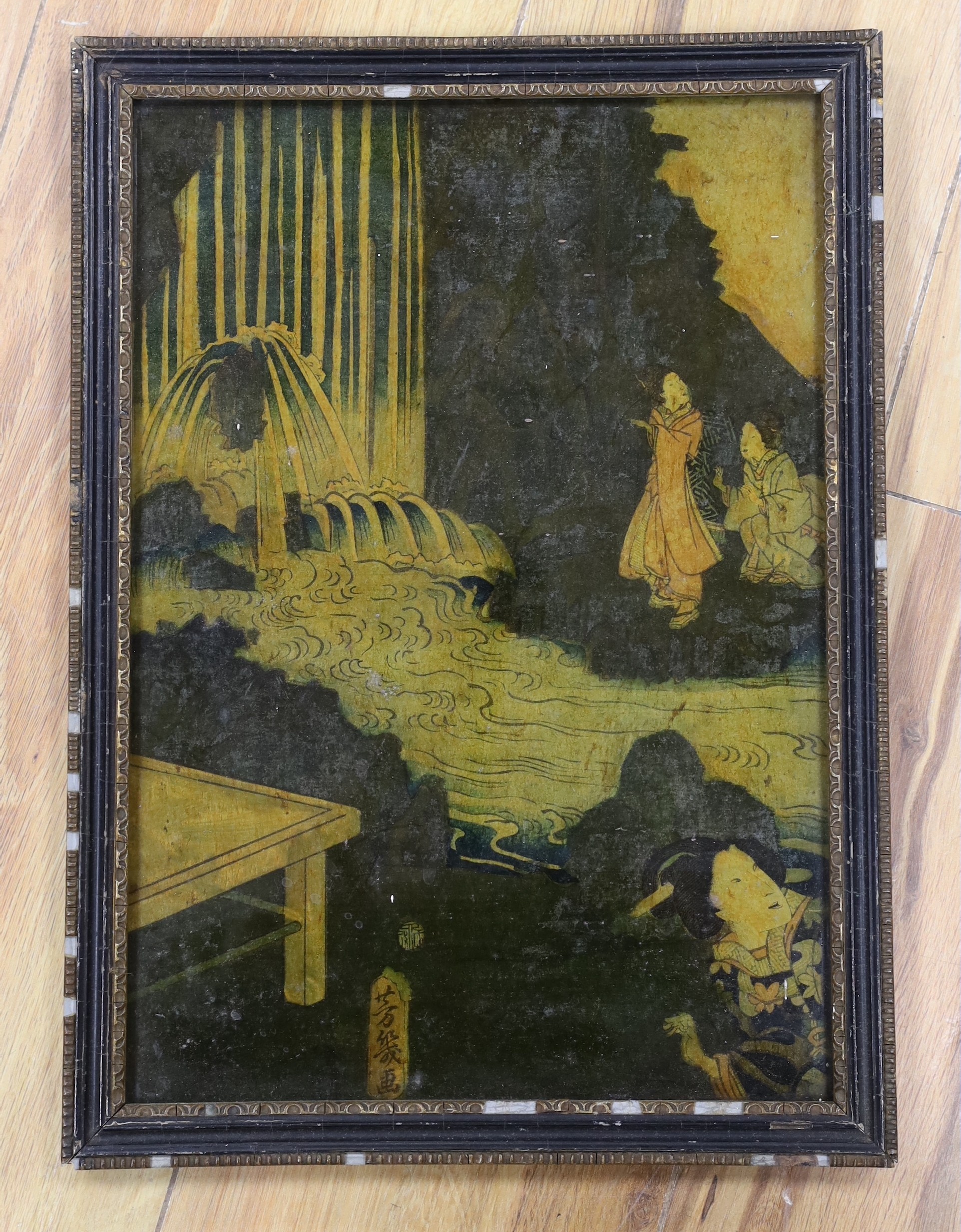 A 19th century reverse print on glass, Japanese figures beside a waterfall, 33 x 23cm